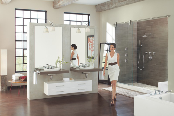 woman walking across luxury bathroom