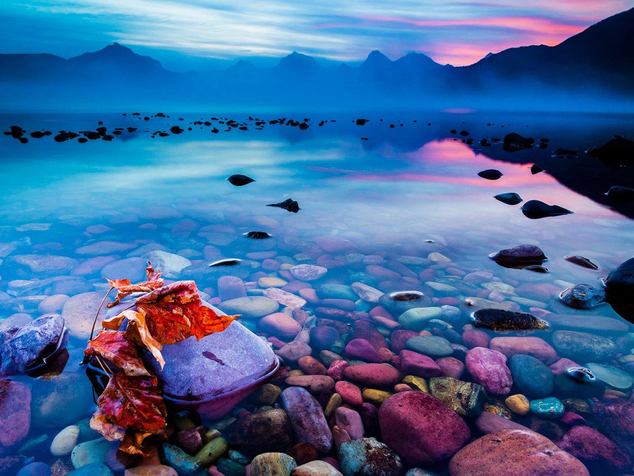 Colorful sunrise over lake MacDonald