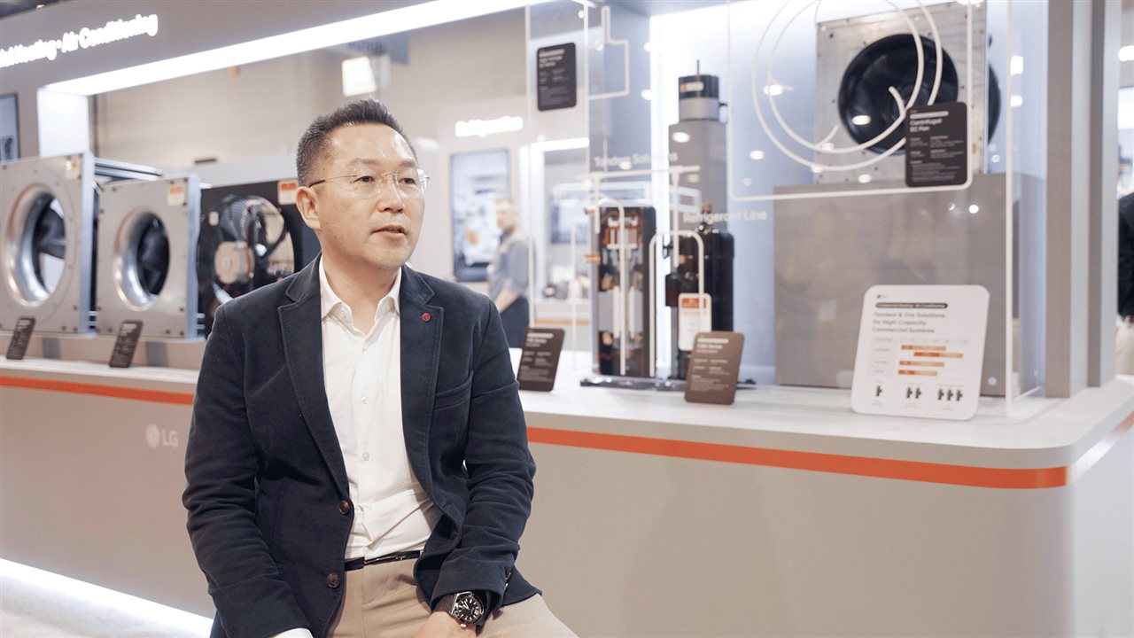 John Kim, a vice president at LG Home Appliance Solution Company, emphasizes performance tech at an AHR Expo 2026 exhibit.