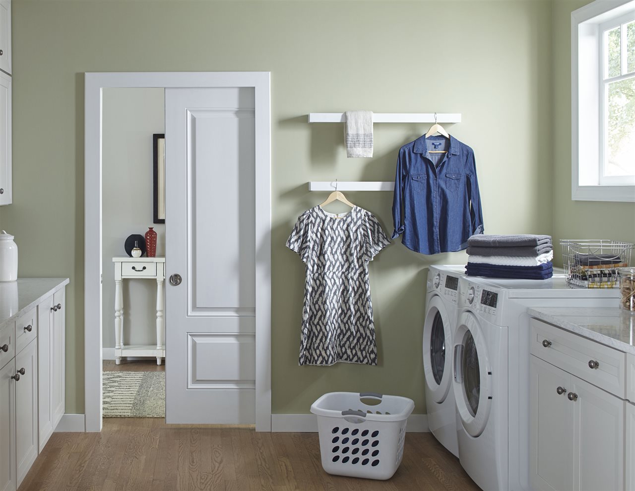 Pocket door between living room and laundry room. Johnson Hardware makes precision, American-made hardware for pocket doors.