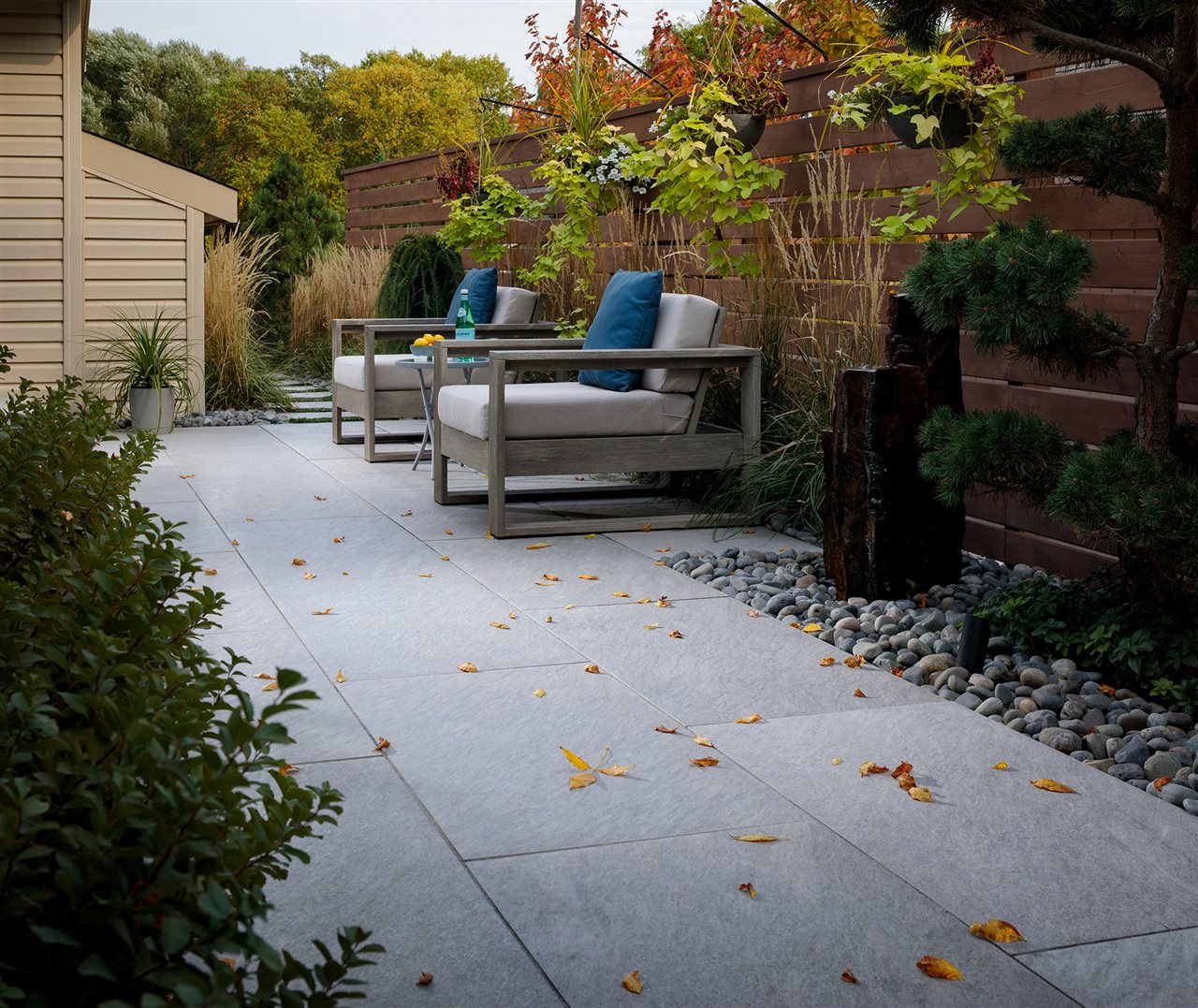 Paver patio with comfortable furniture.