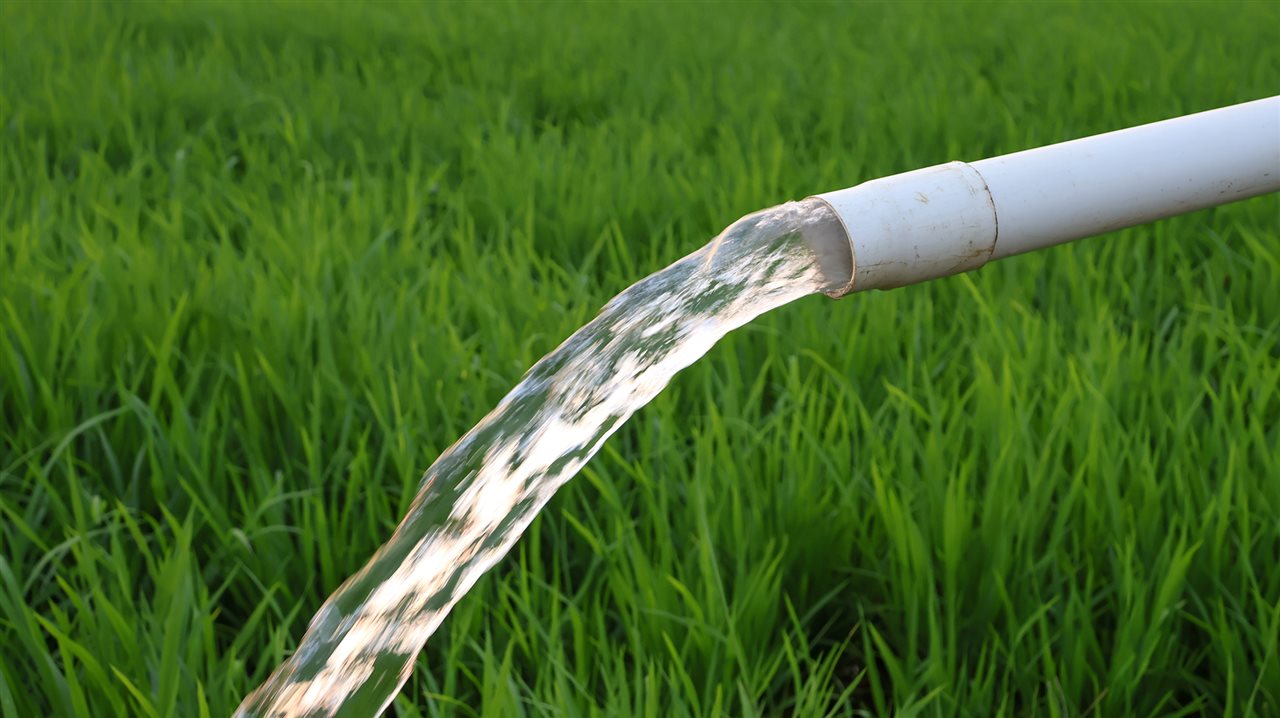 Water pours from a vinyl pipe. Learn more about PVC pipe and other vinyl products you use every day at www.vinylinfo.org