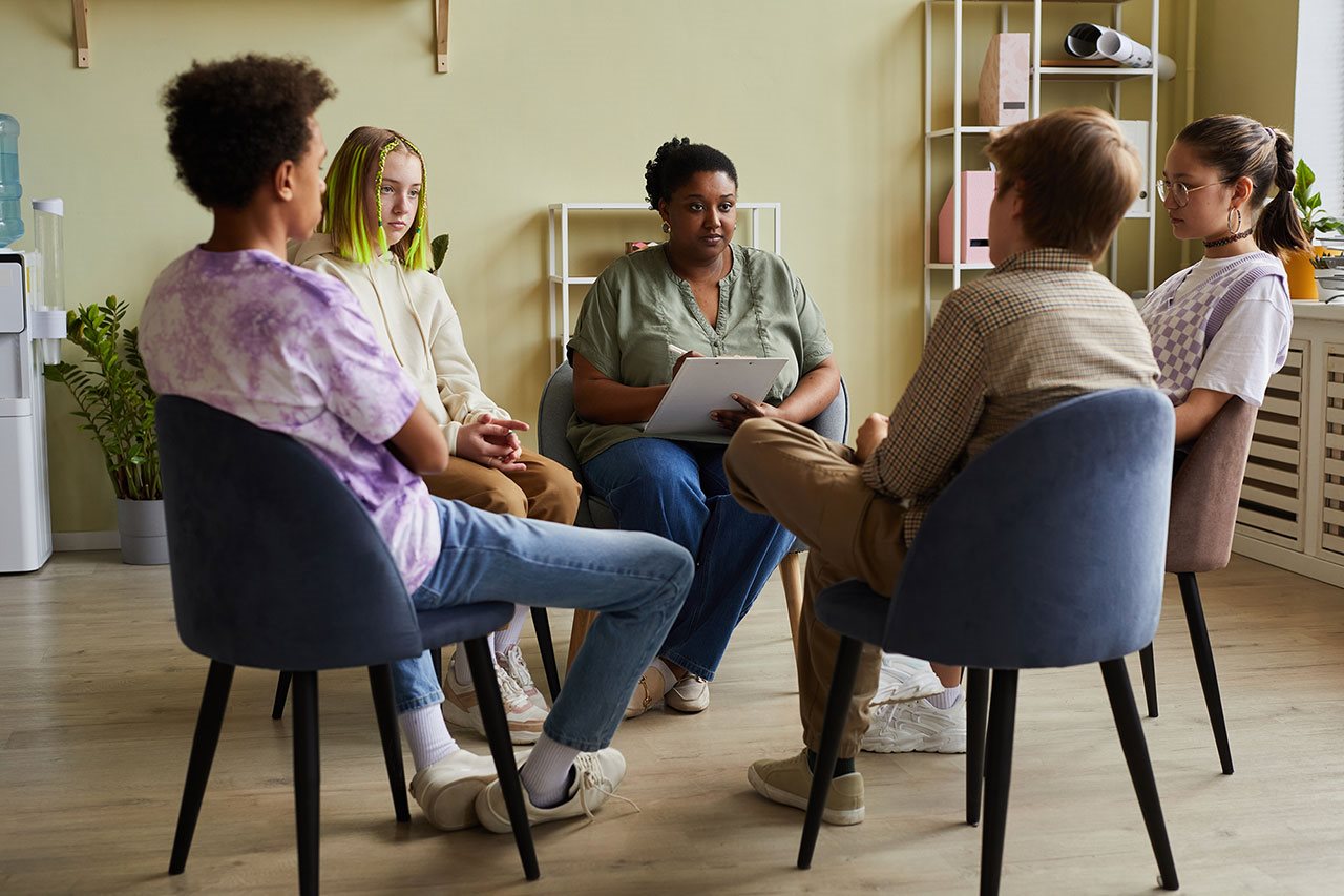 Group of teens talking in group