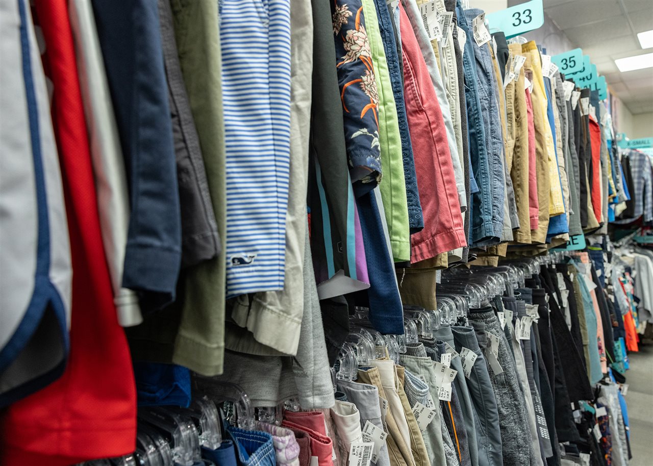 Rack of clothes in a Plato's Closet store.