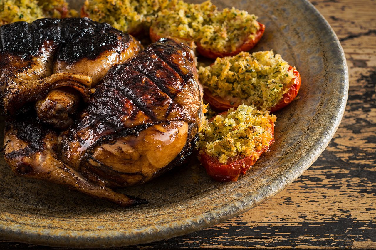Balsamic Grilled Chicken with Tomatoes on a plate