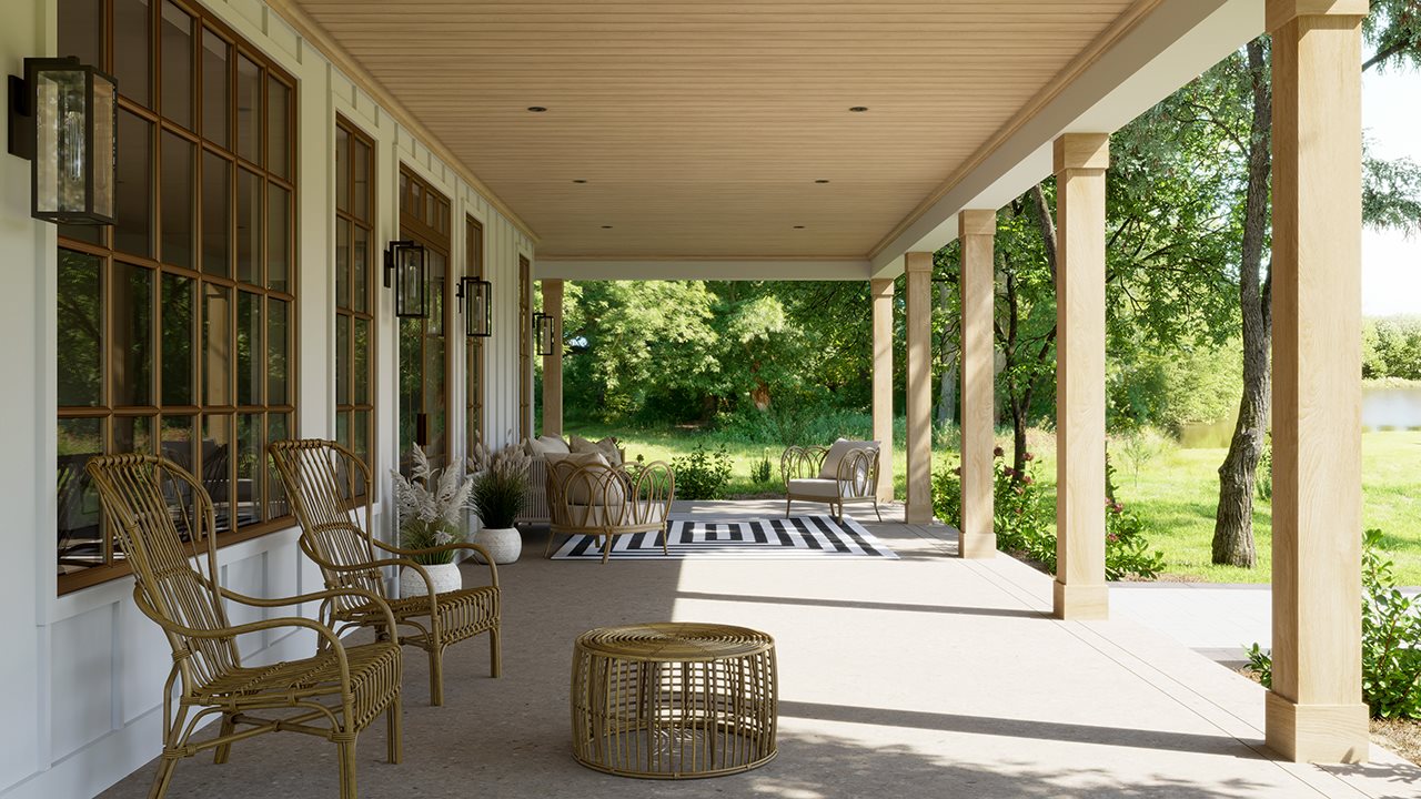 Beautiful under deck patio featuring column wrapped deck posts, recessed lighting and airy outdoor furtinure.