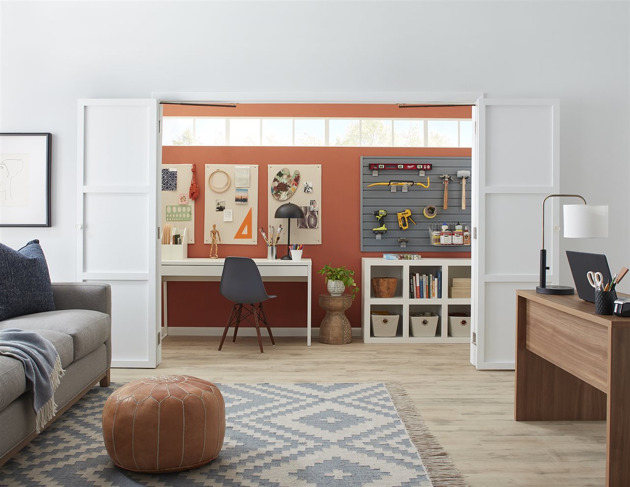 Bi-fold door between living room and craft/office area. Johnson Hardware makes precision, American-made hardware for bi-fold doors.