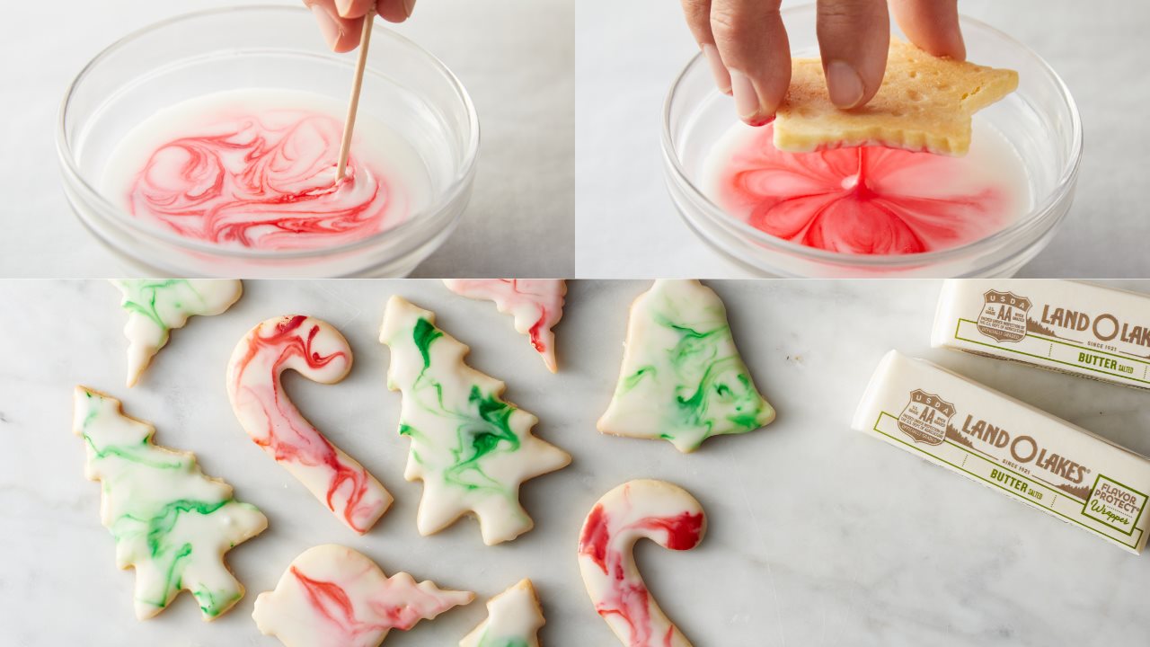 Butter cookies with swirled frosting and sticks of Land O'Lakes butter.