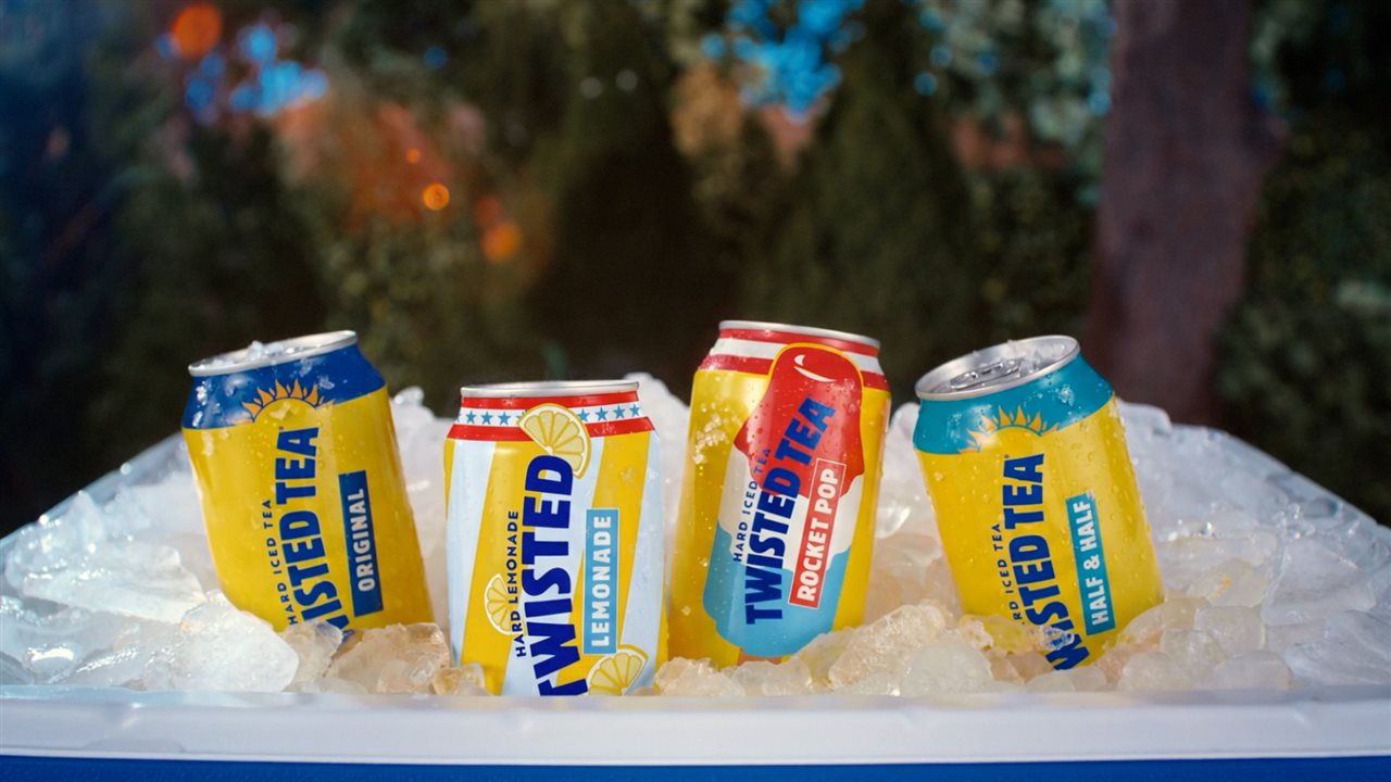 Cold cans of Twisted Tea flavors Original, Half & Half, Rocket Pop and Lemonade on lce.