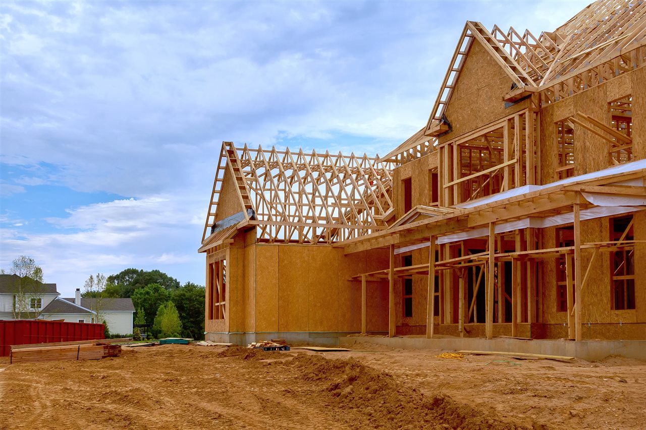 The wooden frame of a home under construction.