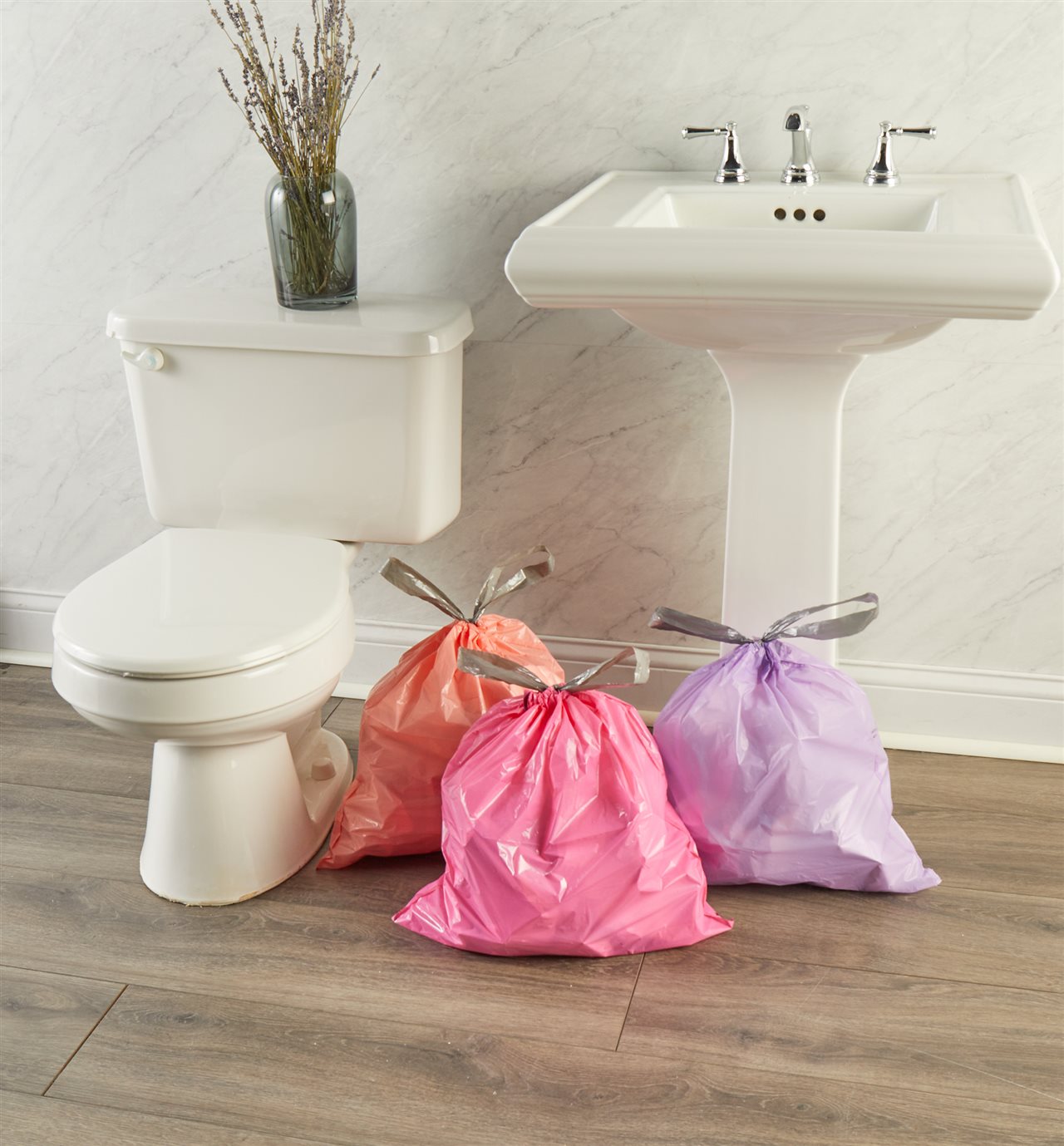 Trash bags in a bathroom.
