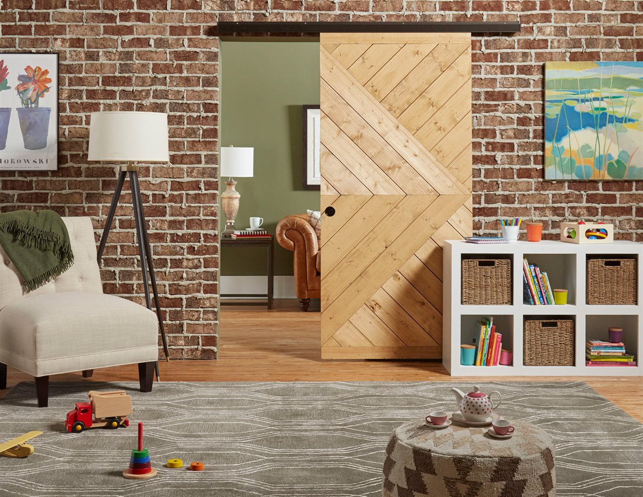 Wall mounted sliding door between two rooms. Johnson Hardware makes precision, American-made hardware for sliding doors.