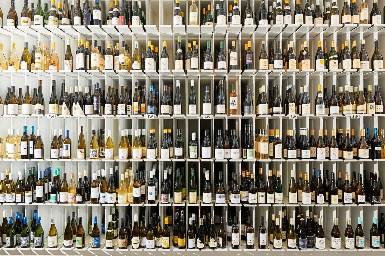 Rack of wine with many bottles
