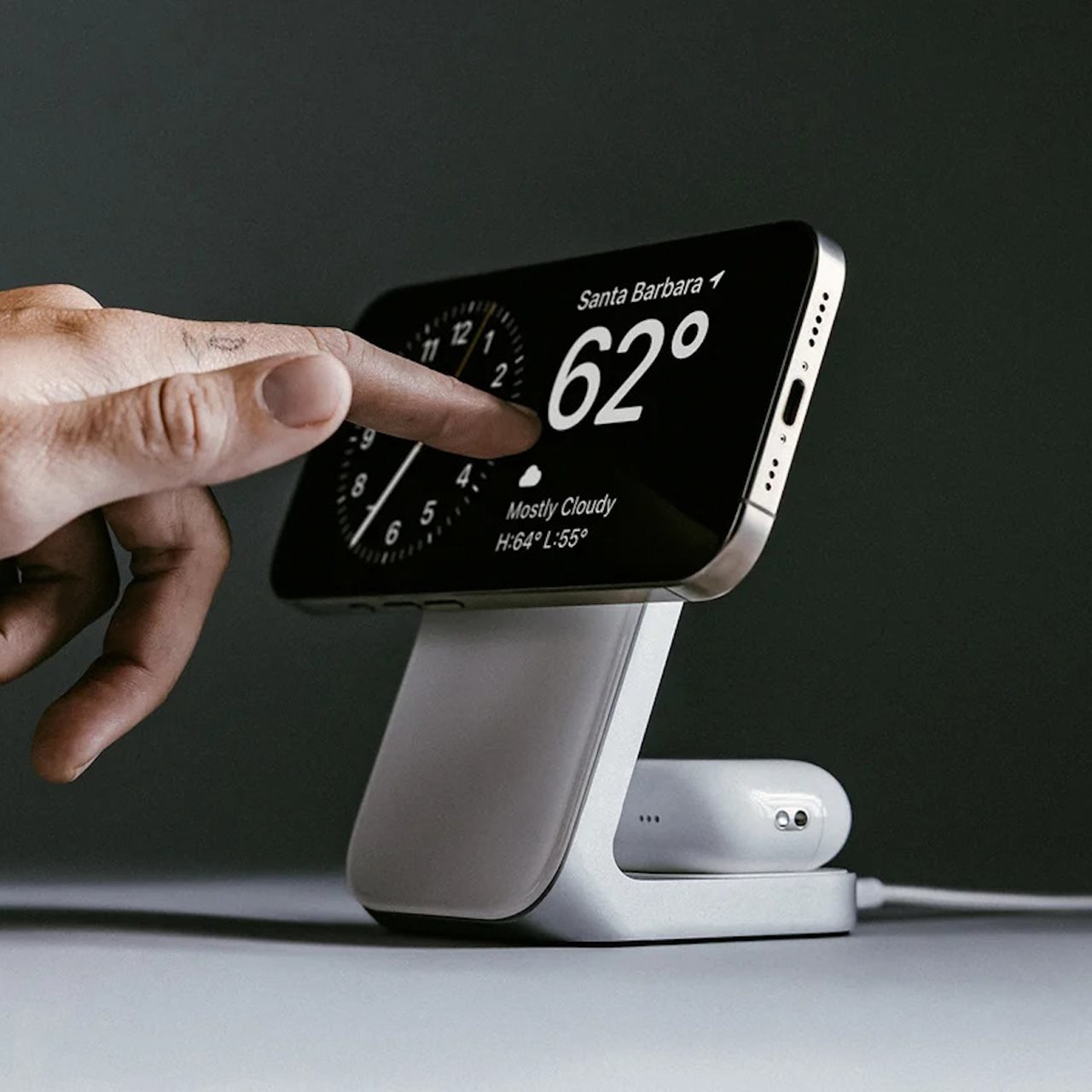 Figure touching the Nomad Stand One 2-in-1