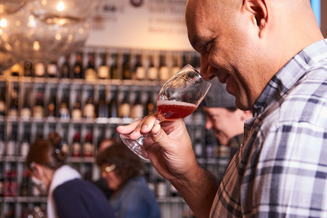 People attending wine tasting event.
