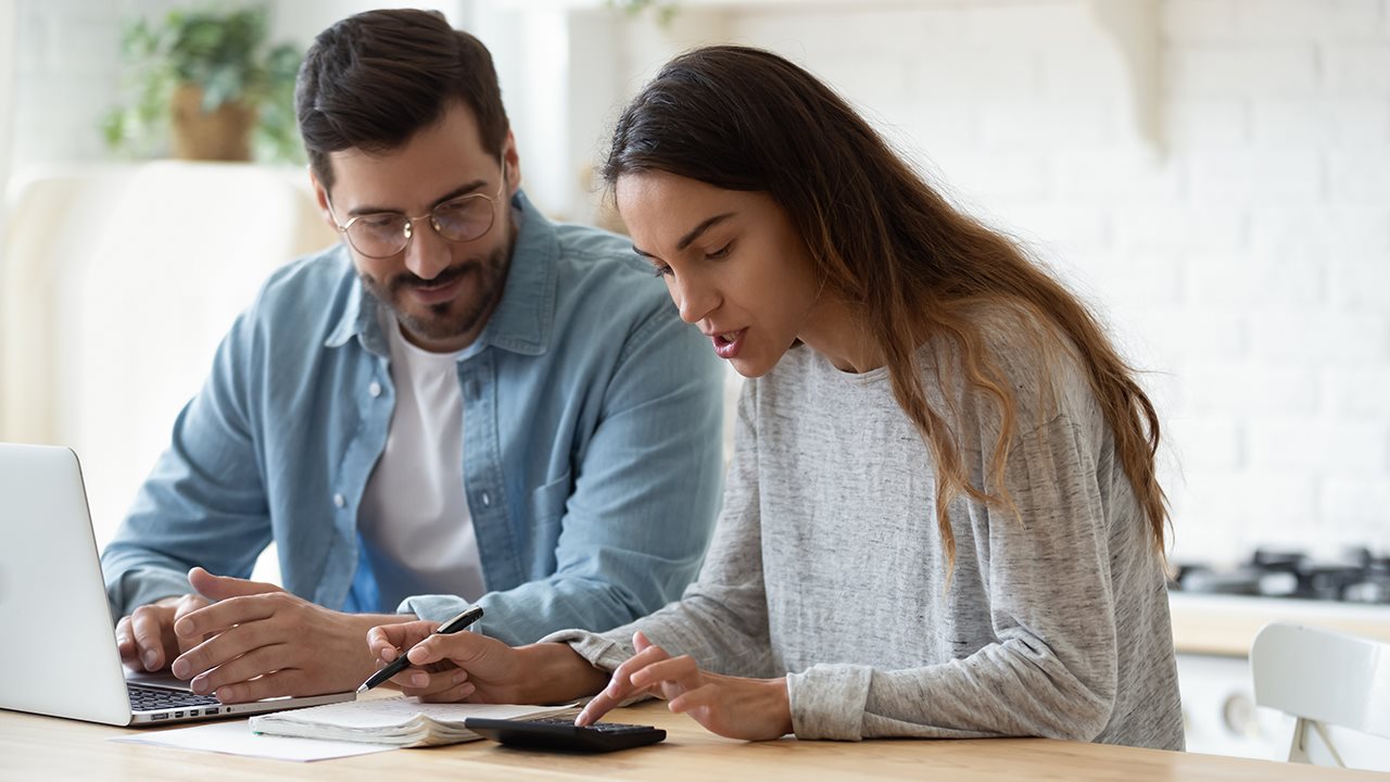 Dad working with daughter on college budget