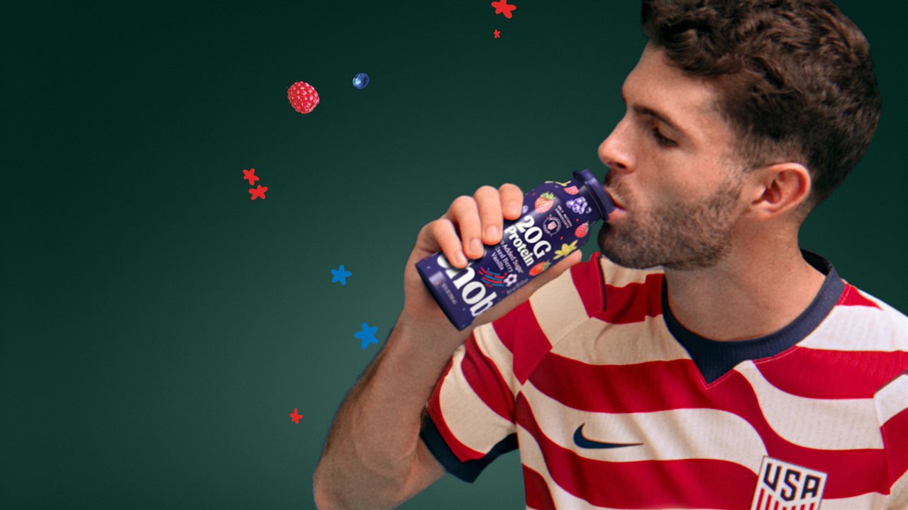 Christian Pulisic from US Soccer drinking a Chobani.