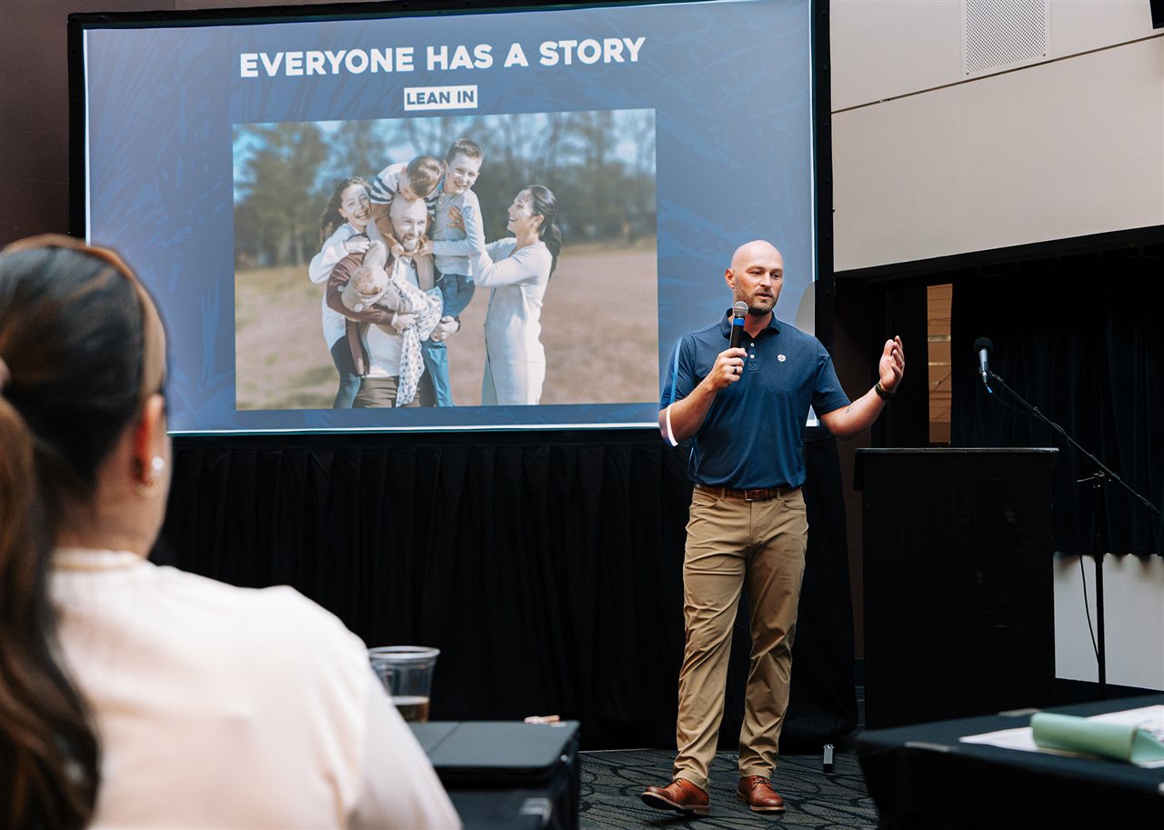 Connor Shaw sharing his sudden cardiac arrest (SCA) survival story with the group.