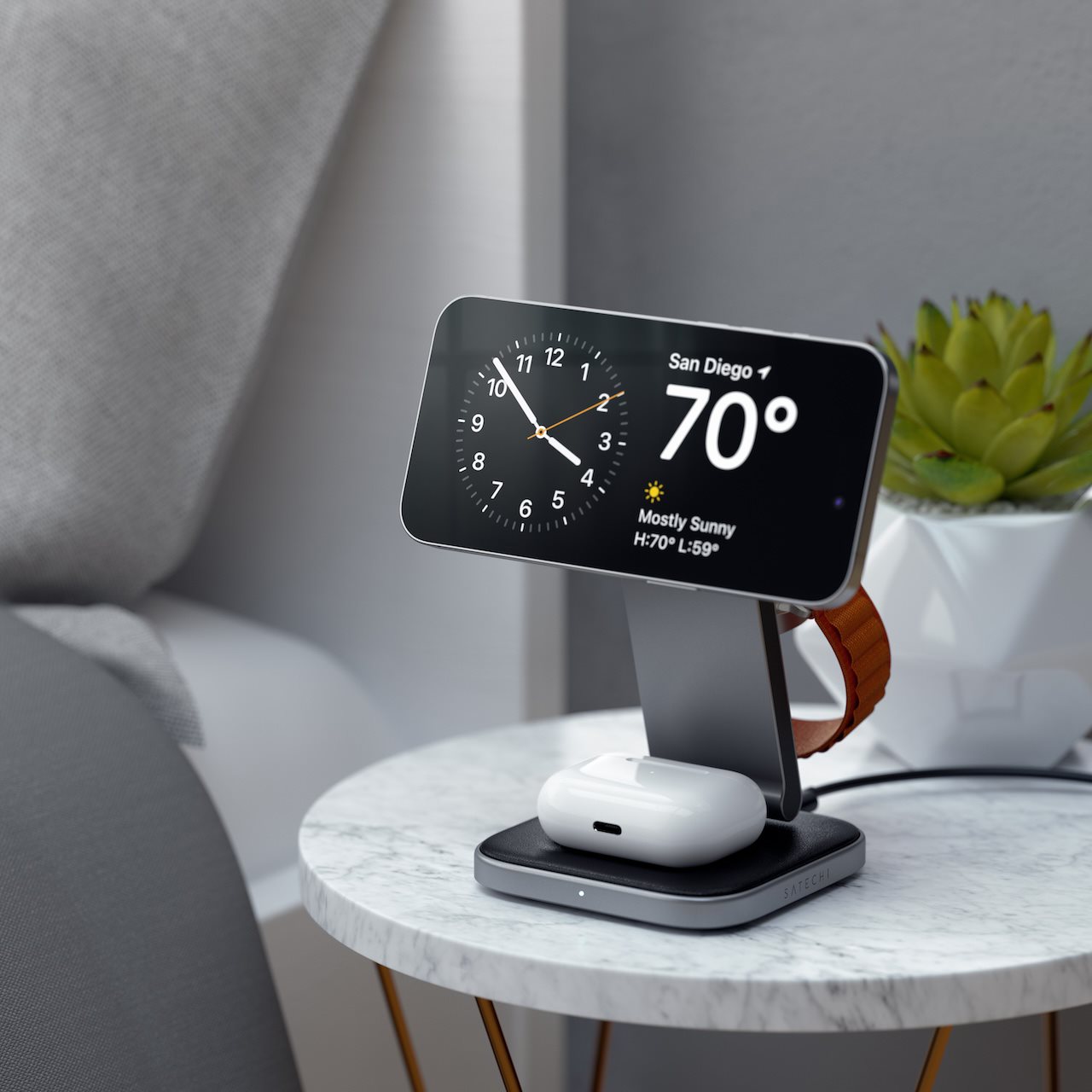 Digital clock on charger. The Wireless Power Consortium (WPC) ensures wireless charging works efficiently.