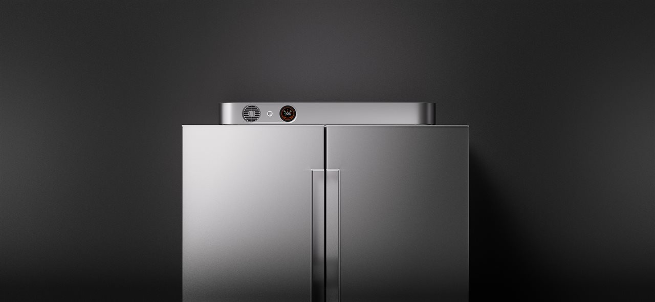 FridgeGuard, the world's slimmest smart fridge backup from Jackery, on top of a refrigerator.