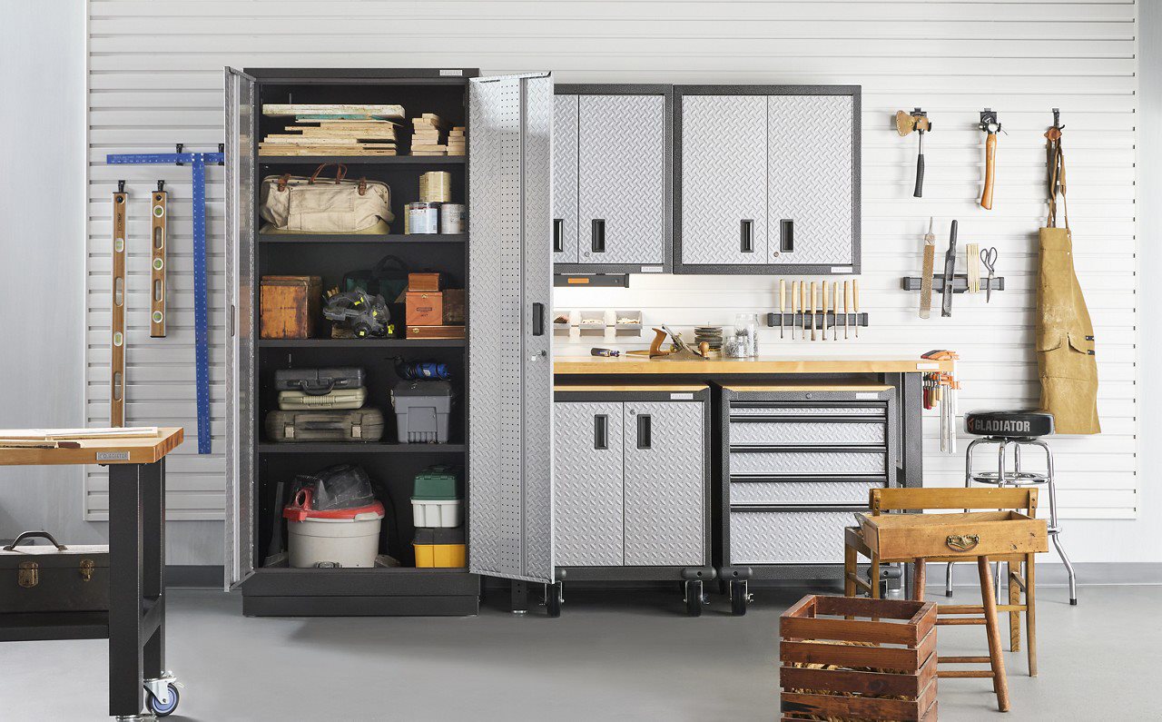beautiful garage with cabinets and peg board
