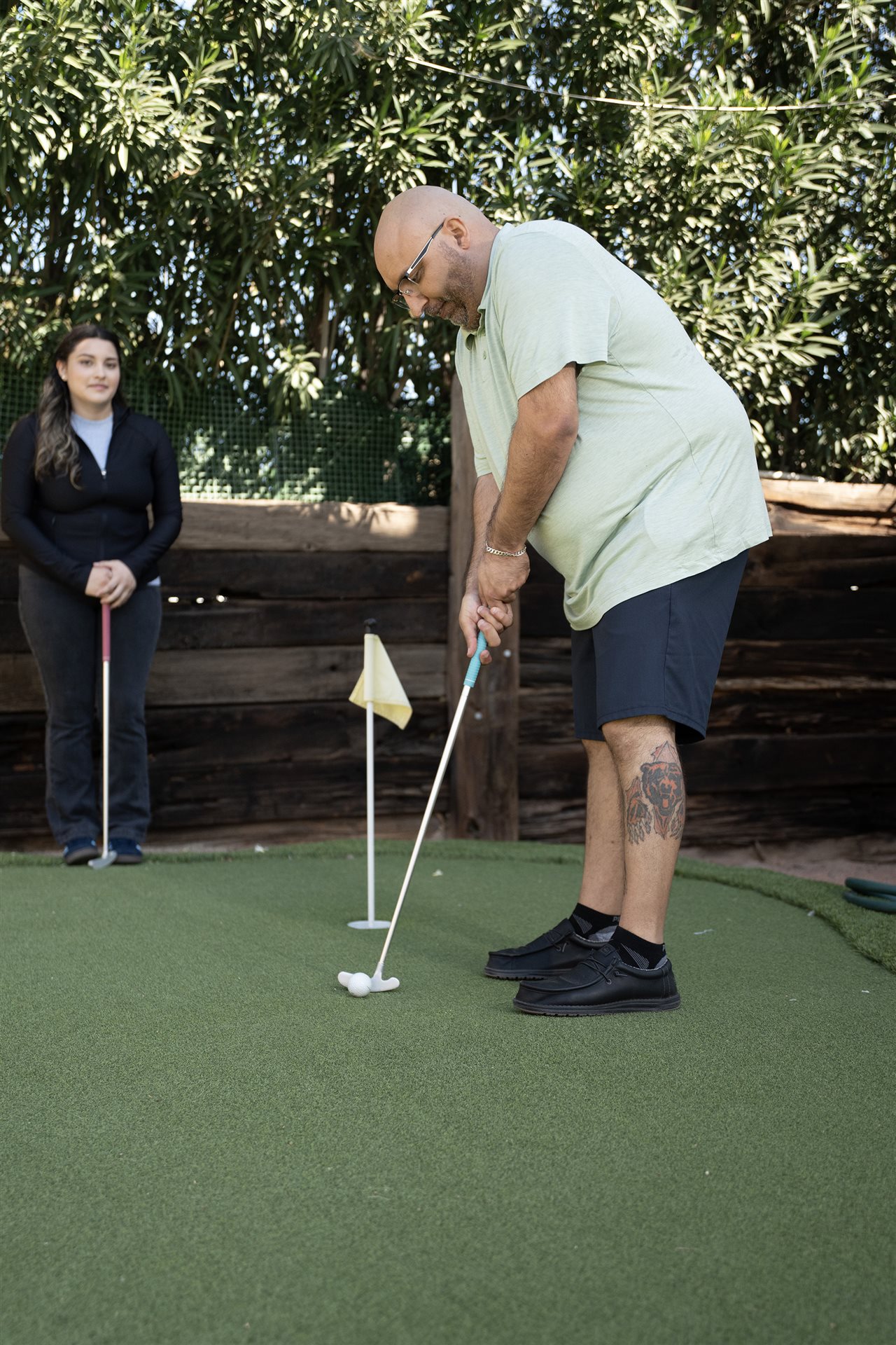 Chris and daughter playing mini golf. Qfitlia works by lowering antithrombin, a protein that normally slows blood clotting.
