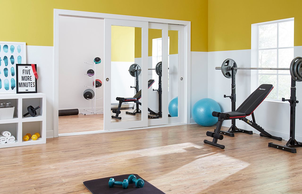 Exercise room with multi pass pocket doors to seperate work-out room