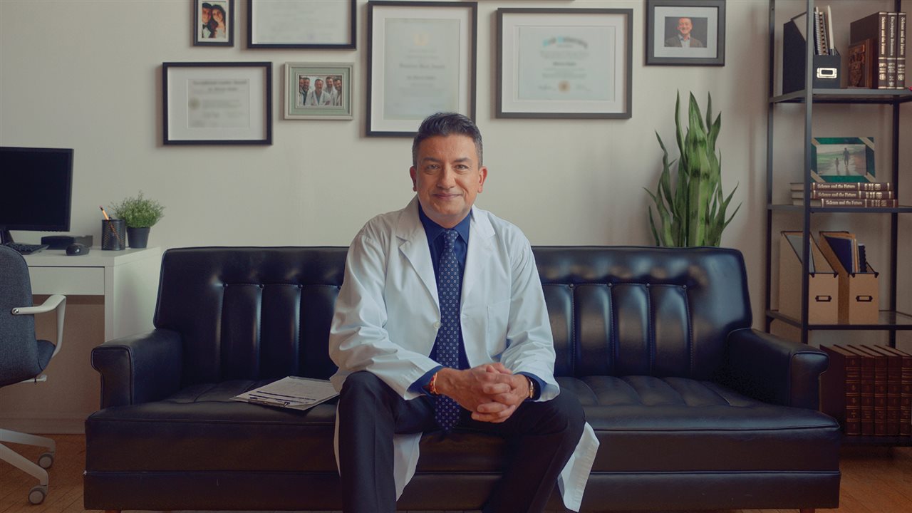 Doctor sits on the couch in his office. There are clinical trials for all types of diseases and conditions.