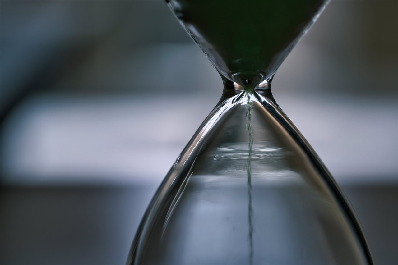 Sand running trhough an hour glass. Cognizant says it is important to  remediate vulnerabilities at machine speed.