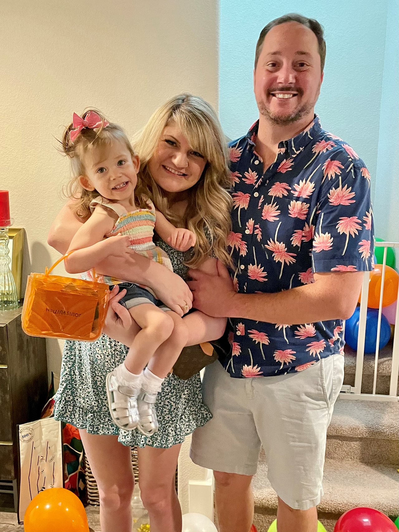 Kennedy, who died from the flu at the age of 4, and her parents at a Birthday celebration.